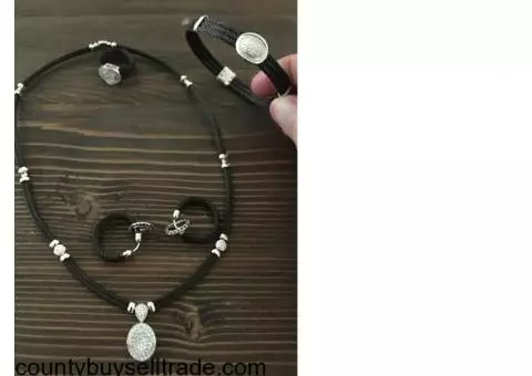 Diamond necklace, bracelet, earrings and ring
